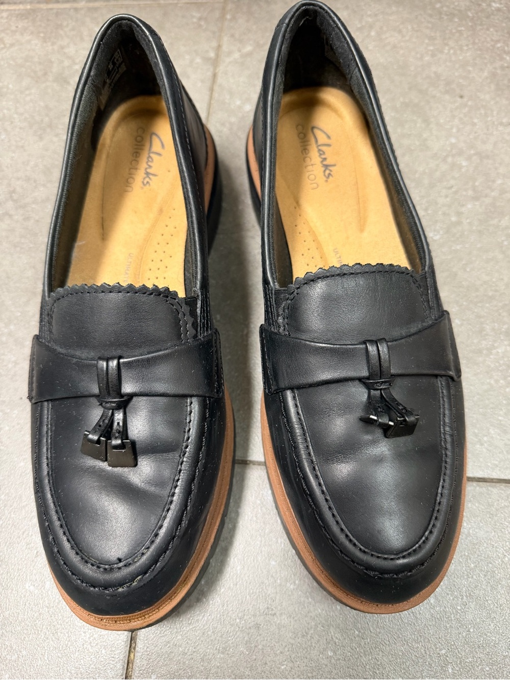 Clarks Black Leather Tassel Loafers with Tan Sole